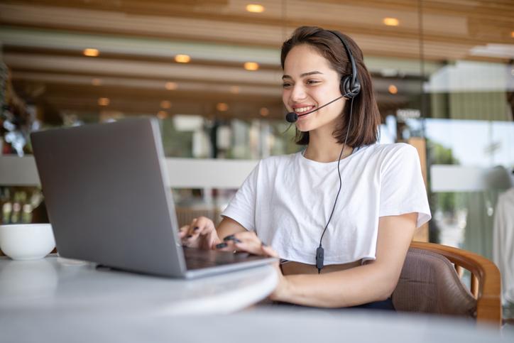 Call Center Employee Providing Customer Service in a Cafe