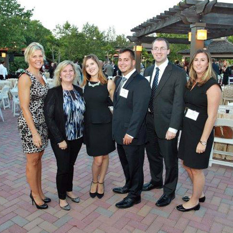 Compass Staff at a Long Island Business News Event